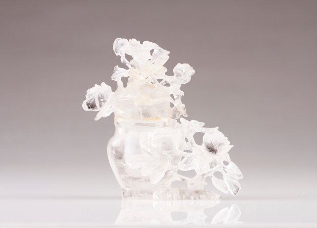 A late 19th, early 20th century carved Rock Crystal Chinese flask with cover